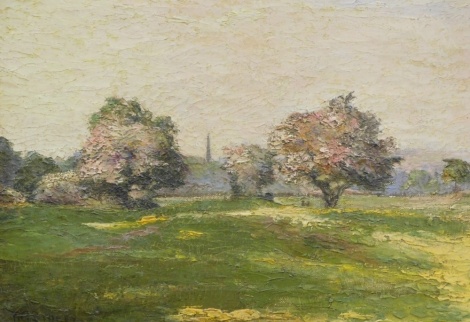 Thomas George Storey (1865-1935). Landscape, blossom trees before spire, oil on canvas, signed, labelled verso, 25cm x 35cm.