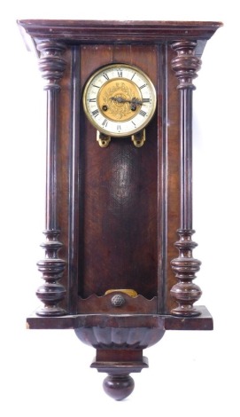 A Vienna wall clock, in walnut case, simulated enamel dial, 70cm high. (AF)