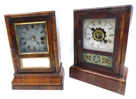 A late 19thC American mantel clock, by Bruster and Co of Bristol, Connecticut, in a rosewood case, associated printed dial, 25cm high, and another similar by the Newhaven Clock Company, with alarm, 25cm high.