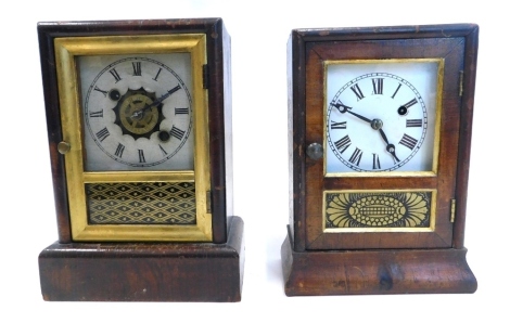 A late 19thC American mantel clock, by Newhaven Clock Company, with painted and alarm, 24cm high, and another similar by Seth Thomas of Plymouth, with associated dial in a pine case, 23cm high.