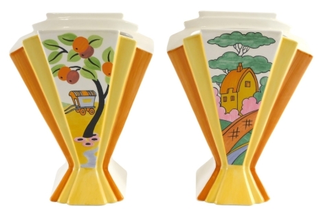 A pair of Clarice Cliff limited edition modern orange roof cottage vases, printed marks beneath, 22cm high,