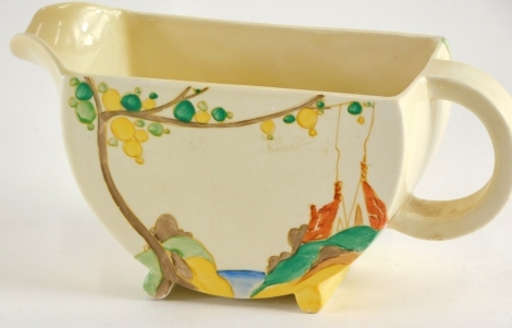 A Clarice Cliff pottery Bizarre Orange Secrets pattern jug, printed marks beneath, 9cm high.