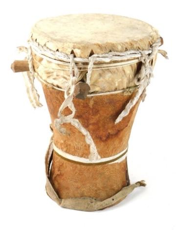 An African tribal drum, with hide top and body, with wooden carcass, 30cm high, the top, 19cm diameter.