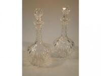 A pair of 19thC heavy cut glass sherry decanters