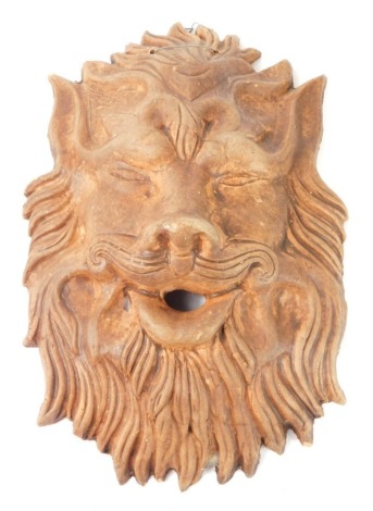 A terracotta style wall mounted lion mask water feature, 26cm high.