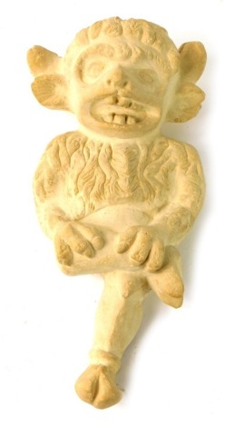 A stone carving of the Lincoln Imp, 28cm high.