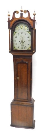 A 19thC longcase clock, the arched painted dial decorated with shells, flowers, etc., with an eight day movement in oak, mahogany and parquetry banded case, 214cm high.