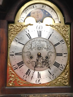 John Ivison, Carlisle. A George III mahogany longcase clock, the brass dial with moon phase subsidiary date aperture and engraved with scrolls, with an eight day movement, in a figured mahogany case on short bracket feet, 225cm high. - 2