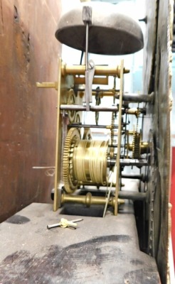 John Ivison, Carlisle. A George III mahogany longcase clock, the brass dial with moon phase subsidiary date aperture and engraved with scrolls, with an eight day movement, in a figured mahogany case on short bracket feet, 225cm high. - 3