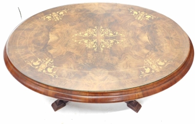 A walnut and marquetry coffee table, the oval top with a moulded edge on four turned columns and carved splayed legs, formed from a Victorian loo table, 100cm wide. - 4