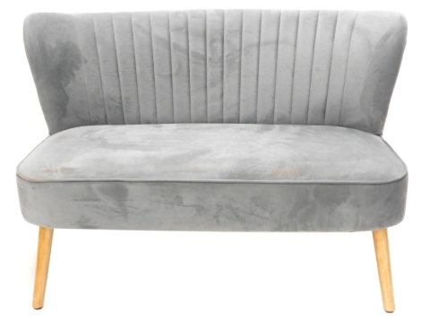 A small grey upholstered late 20th/ early 21stC sofa, on turned tapering legs, 103cm wide.