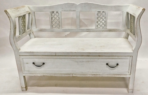 A painted continental bench, with pierced supports, the solid seat above a frieze drawer on stiles, 115cm wide.