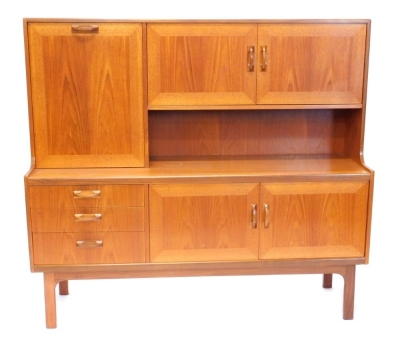 A G Plan style teak sideboard, the raised back with an arrangement of three door, the base with an arrangement of three drawers and two further doors, each with solid wooden handles on plain feet, 160cm wide.