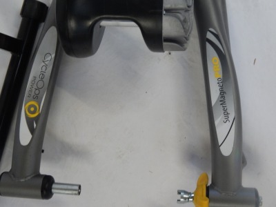 A Super Magneto cycle turbo trainer, and a Pro Cycleops cycle turbo trainer. (2) - 2