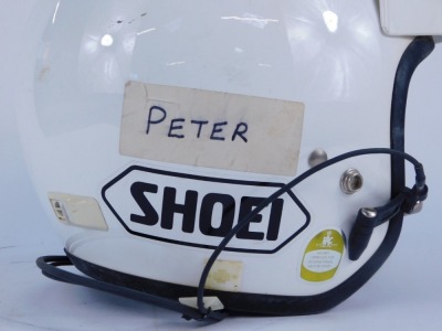 A Shoei Rally helmet, with speaker, in white. - 2