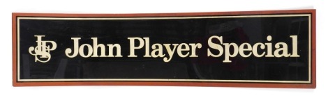 A John Player Special plastic advertising sign, on cream and black ground with red border, 57cm x 28cm.