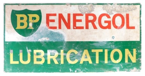 A BP painted metal advertising sign, stamped BP Energol Lubrication, on a green and cream ground, 23cm x 104cm. (AF)