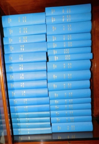 A collection of Classic Car Magazines, professionally bound, in blue bindings with a digital memory stick for rapid access to the material, from the author Eric Dymock, volumes 1-26, 1973-1999, together with a feature from writer Eric Dymock with his own