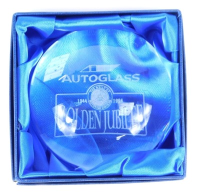 An Autoglass glass paperweight, commemorating the Golden Jubilee of The Guild of Motoring Writers 1944-1994, boxed.