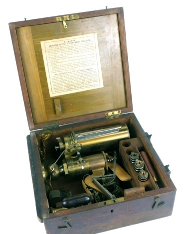 An Elliott Brothers Steam Engine Indicator, with accessories in a wooden chest by Elliott Bros, London.