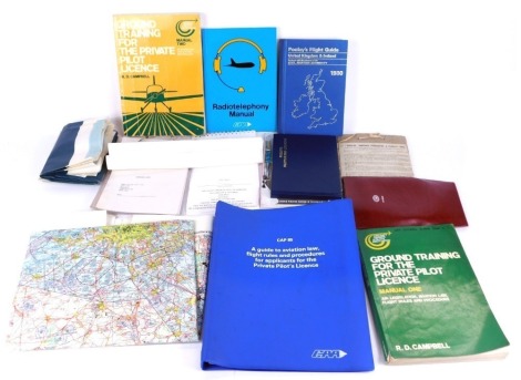 A group of aviation related maps, flight plans, and notes. (1 box)