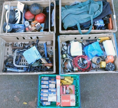 A collection of automobile parts, comprising dials, radiator caps, bulbs, wiring, etc. (4 boxes)