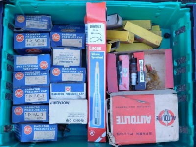 A collection of automobile parts, comprising dials, radiator caps, bulbs, wiring, etc. (4 boxes) - 6