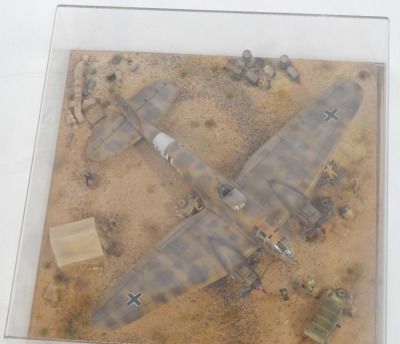 A 1:48 scale cased diorama model Heinkel HE III Bomber, North Africa 1942, 14cm high, 44cm wide, 44cm deep. - 2