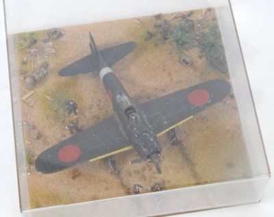 A 1:32 scale cased diorama model of a Mitsubishi Zero AGM, Pacific War, 14cm high, 36cm wide, 36cm deep. - 2