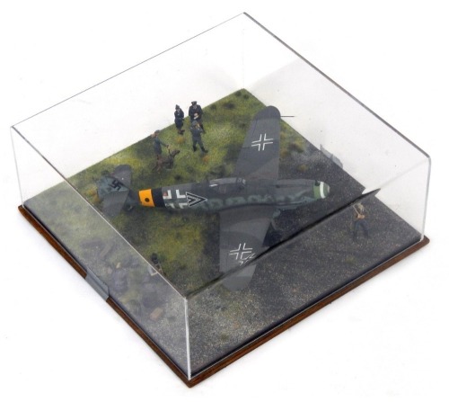 A 1:32 scale cased diorama model of a Messerschmitt 109G, central Germany 1944, 15cm high, 34cm wide, 34cm deep.