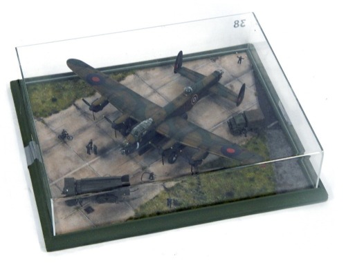 A 1:72 scale cased diorama model of an RAF Lancaster Bomber, circa 1944, 12cm high, 46cm wide, 40cm deep.