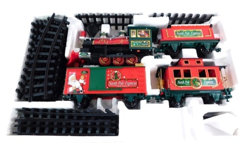 An Eztec battery operated North Pole Express Christmas train set, boxed.