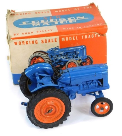 A Chad Valley diecast model of a New Fordson Major tractor, blue, boxed.