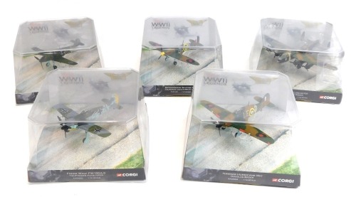 Corgi diecast models of WWII Legends fighter and bomber planes, comprising a Hawker Hurricane MKI, Messerschmitt BM109E-1, Focke Wulff W190A-3, five Avro Lancaster Guy Gibson and Super Marine Spitfire MK1, all boxed.