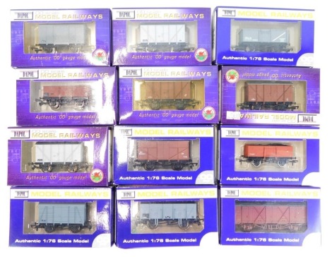 Dapol OO gauge diecast box and bed vans, other wagons, etc., all boxed. (12)
