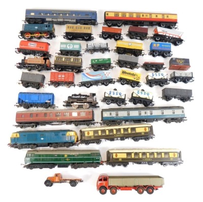 A Hornby diecast OO gauge diesel locomotive, together with coaches, wagons, tankards, etc. (2 trays)