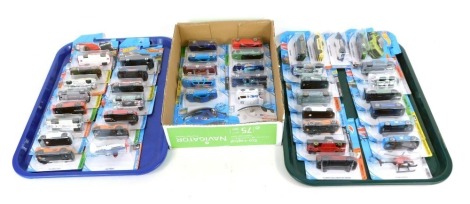 Hot Wheels diecast vehicles, a helicopter and aeroplane, all in blister packs. (2 trays and a box)