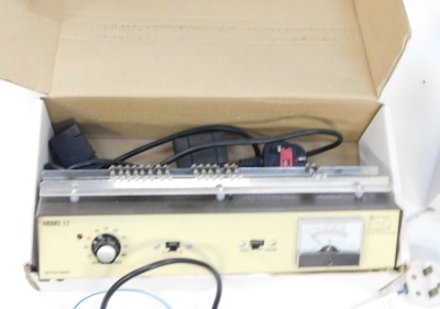 A Gauge Master Superior electronic model locomotive tester and transformer controller, model LT, boxed, and further controllers. (1 box) - 2