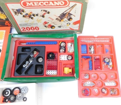 A Meccano Tri-ang set number four, 2000 motorised construction set 0/85042, and a design two model helicopter 5700, all boxed. (3) - 2