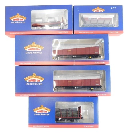 Bachmann Branchline OO gauge rolling stock, comprising 38-020CEA covered hopper wagon (weathered), 38-350A BZA steel carrier wagon EWS, 38-301 OTA timber carrier wagon EWS with lumber load, and 37-606A VGA sliding wall van EWS. (5)