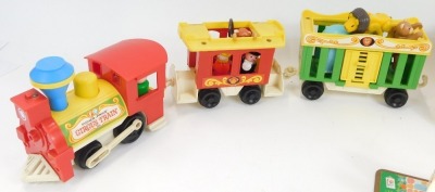 Fisher Price toys, comprising Fisher Price Mini Bus, Fisher Price Play Family Camper, Fisher Price Circus Train, and a Fisher Price Merry Go Round. (4) - 2