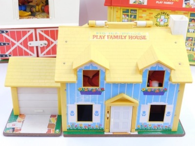 A Fisher Price Toys Play Family House, a Fisher Price Play Family Farm, and a Fisher Price Play Family Children's Hospital, boxed. (3) - 4