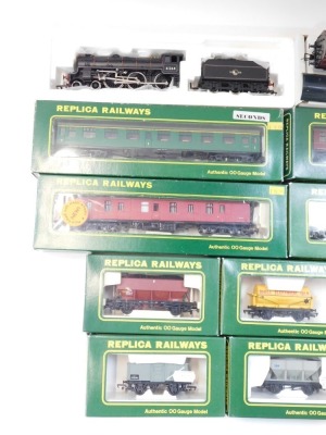 Replica Railways OO gauge coaches and rolling stock, to include No 13801 tank wagon Shell Electric Oils, No 14101 46 ton GLW hopper HBA, No 12146 MkI BCK BR maroon, No 12173 MkI BG BR crimson, etc. (12) - 2