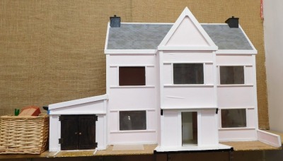 A hand built doll's house, and dolls furniture.