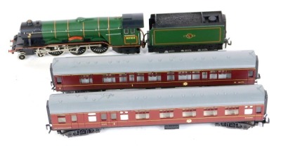 A Trix Trains OO gauge Class A3 locomotive 4472 Flying Scotsman, BR lined green, together with two British Rail maroon coaches. (3)