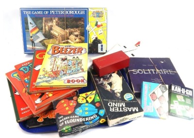 The Game of Peterborough board game, and other games to include Solitaire, Kan-U-Go, draughts, chess, etc, a model of a British Airways G-BBDG Concorde (AF), together with a group of annuals. (1 tray)