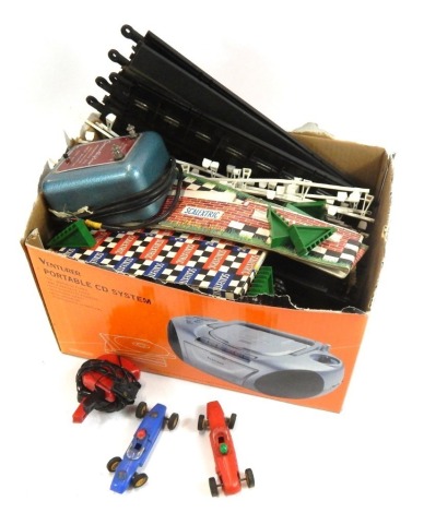 Scalextric, to include track, barriers, two Tri-Ang Scalextric cars, Cooper Austin MMC66 and a Lotus MMC67. (1 box)