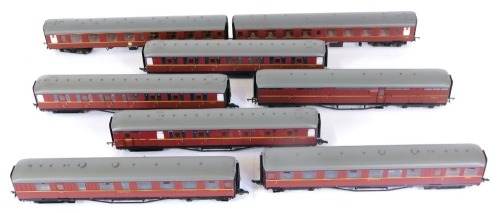 Eight Hornby OO gauge coaches, boxed, comprising a BR mark 1 corridor second second class coach M24912 (with lights), R4714, a BR mark 1 tourist second open coach E4542, R4621, BR 61'' 6in corridor first class coach SC11026E, R4261A, a BR (ex LNER) 61' 6i