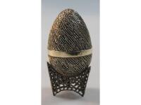 Stuart Delvin. A decorative silver egg