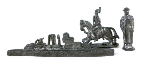 Lead army figures, submarine, naval officer and figure on a horseback. (3)